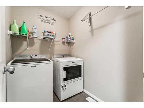 58 Livingston Gate Ne, Calgary, AB - Indoor Photo Showing Laundry Room