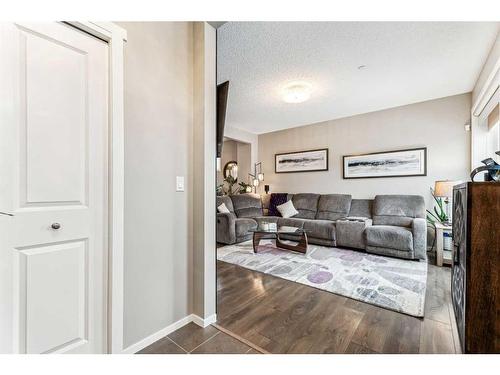 58 Livingston Gate Ne, Calgary, AB - Indoor Photo Showing Living Room