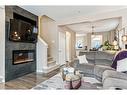 58 Livingston Gate Ne, Calgary, AB  - Indoor Photo Showing Living Room With Fireplace 