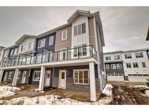 801-6 Merganser Drive West, Chestermere, AB - Outdoor With Facade