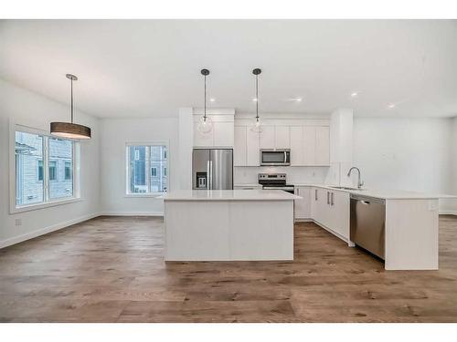 801-6 Merganser Drive West, Chestermere, AB - Indoor Photo Showing Kitchen With Stainless Steel Kitchen With Upgraded Kitchen