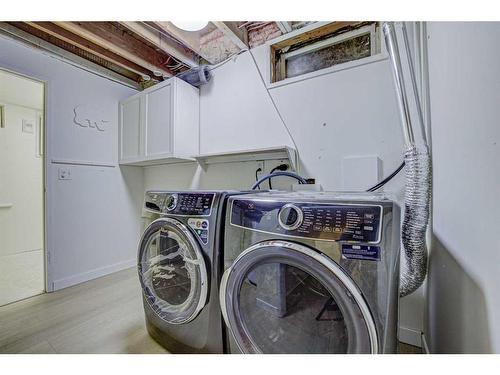 203 Cedarwood Road Sw, Calgary, AB - Indoor Photo Showing Laundry Room