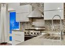 1918 17 Avenue Sw, Calgary, AB  - Indoor Photo Showing Kitchen With Double Sink With Upgraded Kitchen 