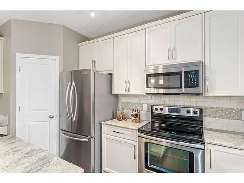 74 Walden Crescent Se, Calgary, AB - Indoor Photo Showing Kitchen With Stainless Steel Kitchen