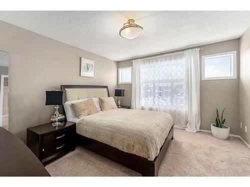 74 Walden Crescent Se, Calgary, AB - Indoor Photo Showing Bedroom