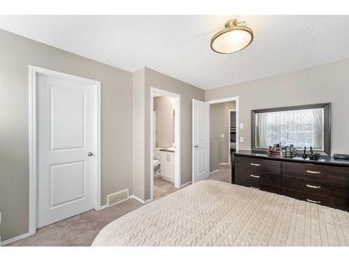 74 Walden Crescent Se, Calgary, AB - Indoor Photo Showing Bedroom