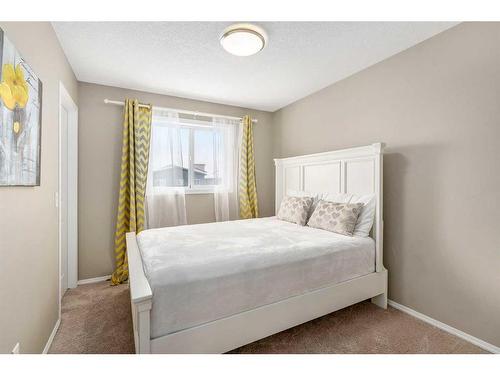 74 Walden Crescent Se, Calgary, AB - Indoor Photo Showing Bedroom