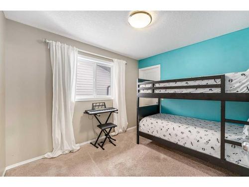 74 Walden Crescent Se, Calgary, AB - Indoor Photo Showing Bedroom