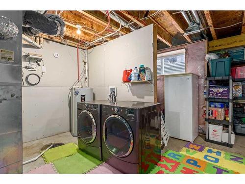 74 Walden Crescent Se, Calgary, AB - Indoor Photo Showing Laundry Room