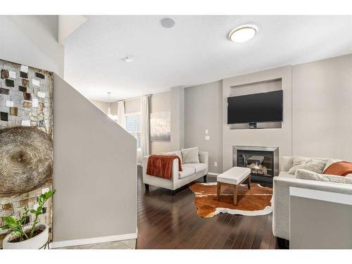 74 Walden Crescent Se, Calgary, AB - Indoor Photo Showing Other Room With Fireplace