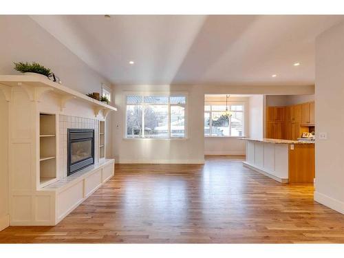 3714 8 Avenue Nw, Calgary, AB - Indoor Photo Showing Living Room With Fireplace