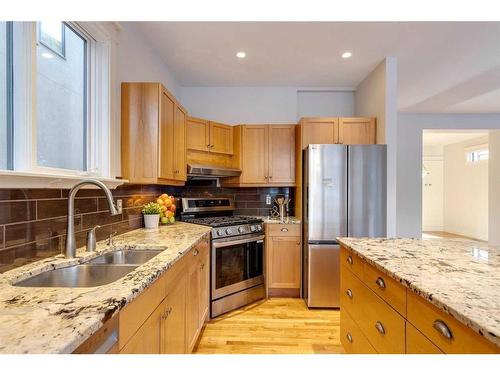 3714 8 Avenue Nw, Calgary, AB - Indoor Photo Showing Kitchen With Double Sink