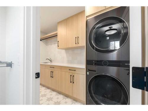 127 Winding River Rise, Rural Rocky View County, AB - Indoor Photo Showing Laundry Room