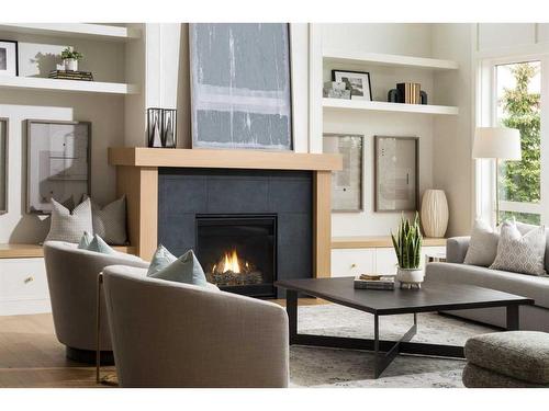 127 Winding River Rise, Rural Rocky View County, AB - Indoor Photo Showing Living Room With Fireplace