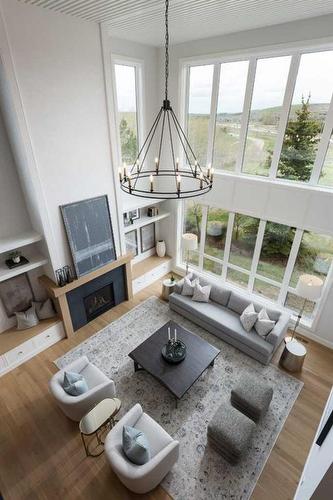 127 Winding River Rise, Rural Rocky View County, AB - Indoor With Fireplace