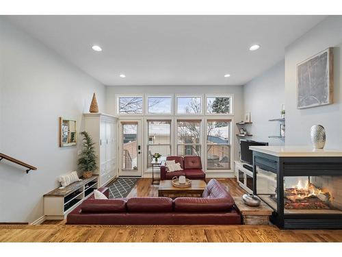 917 19 Avenue Nw, Calgary, AB - Indoor Photo Showing Living Room With Fireplace