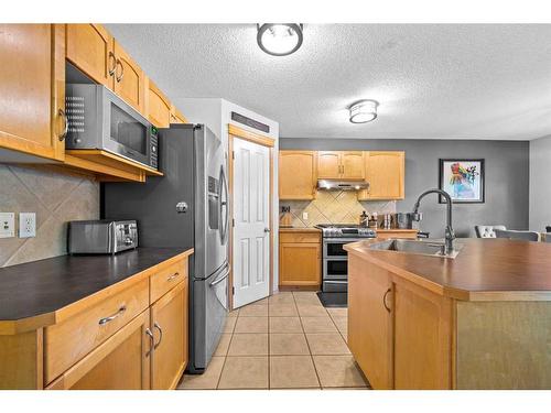 209 Tuscany Ravine Road Nw, Calgary, AB - Indoor Photo Showing Kitchen