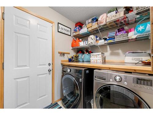 209 Tuscany Ravine Road Nw, Calgary, AB - Indoor Photo Showing Laundry Room