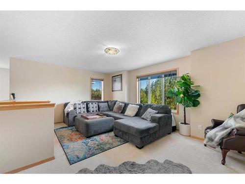 209 Tuscany Ravine Road Nw, Calgary, AB - Indoor Photo Showing Living Room