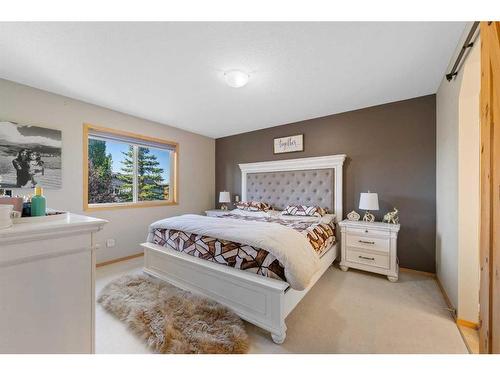 209 Tuscany Ravine Road Nw, Calgary, AB - Indoor Photo Showing Bedroom