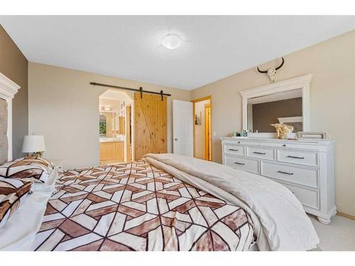 209 Tuscany Ravine Road Nw, Calgary, AB - Indoor Photo Showing Bedroom