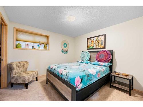 209 Tuscany Ravine Road Nw, Calgary, AB - Indoor Photo Showing Bedroom