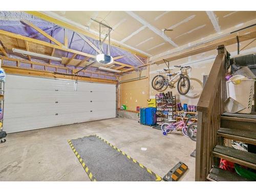 209 Tuscany Ravine Road Nw, Calgary, AB - Indoor Photo Showing Garage