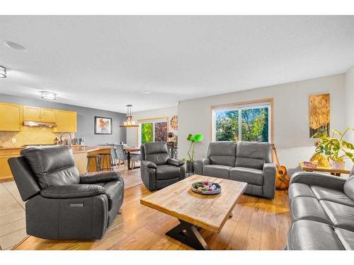 209 Tuscany Ravine Road Nw, Calgary, AB - Indoor Photo Showing Living Room