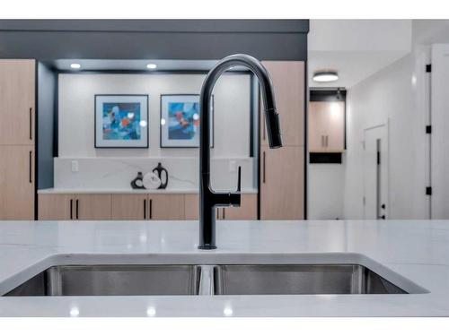 4807 Claret Street Nw, Calgary, AB - Indoor Photo Showing Kitchen With Double Sink