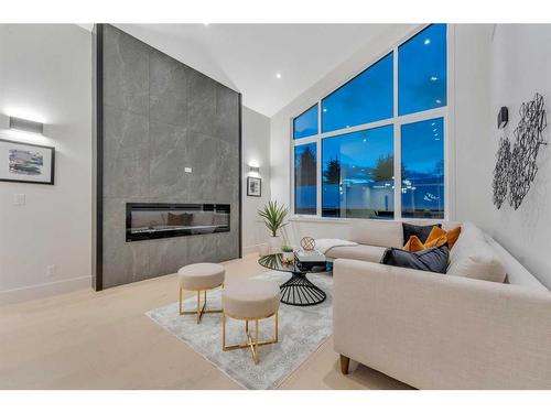 4807 Claret Street Nw, Calgary, AB - Indoor Photo Showing Living Room With Fireplace