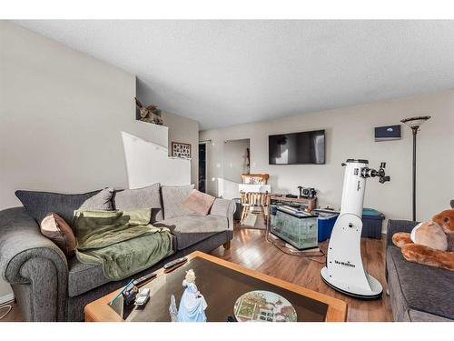 3644 Dover Ridge Drive Se, Calgary, AB - Indoor Photo Showing Living Room