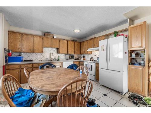 3644 Dover Ridge Drive Se, Calgary, AB - Indoor Photo Showing Kitchen With Double Sink