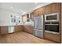 207-8235 8 Avenue Sw, Calgary, AB  - Indoor Photo Showing Kitchen With Stainless Steel Kitchen 