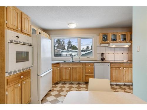 1132 Lake Sylvan Place Se, Calgary, AB - Indoor Photo Showing Kitchen With Double Sink