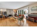 1132 Lake Sylvan Place Se, Calgary, AB  - Indoor Photo Showing Living Room 