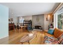 1132 Lake Sylvan Place Se, Calgary, AB  - Indoor Photo Showing Living Room With Fireplace 