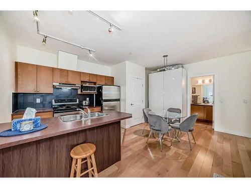 305-328 21 Avenue Sw, Calgary, AB - Indoor Photo Showing Kitchen With Double Sink