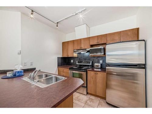 305-328 21 Avenue Sw, Calgary, AB - Indoor Photo Showing Kitchen With Stainless Steel Kitchen With Double Sink