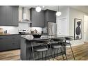 12 Silver Spruce Bay Sw, Calgary, AB  - Indoor Photo Showing Kitchen With Upgraded Kitchen 