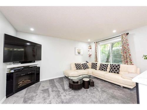 71 Hidden Creek Rise Nw, Calgary, AB - Indoor Photo Showing Living Room