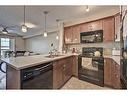 2316-175 Panatella Hill Nw, Calgary, AB  - Indoor Photo Showing Kitchen With Double Sink 