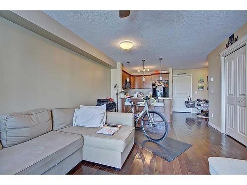 2316-175 Panatella Hill Nw, Calgary, AB - Indoor Photo Showing Living Room