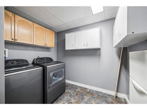 124-223 Tuscany Springs Boulevard Nw, Calgary, AB - Indoor Photo Showing Laundry Room