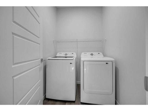 491 Tekarra Drive Nw, Calgary, AB - Indoor Photo Showing Laundry Room