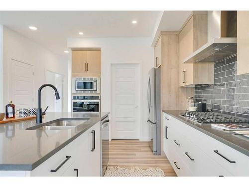 93 Legacy Reach Crescent Se, Calgary, AB - Indoor Photo Showing Kitchen With Double Sink With Upgraded Kitchen