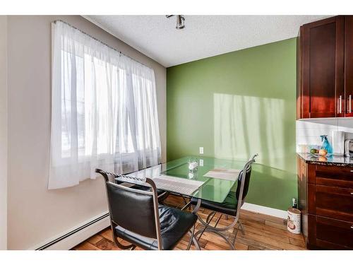 211-4455A Greenview Drive Ne, Calgary, AB - Indoor Photo Showing Dining Room