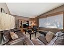 35 Lake Sylvan Close Se, Calgary, AB  - Indoor Photo Showing Living Room 