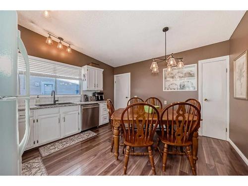 35 Lake Sylvan Close Se, Calgary, AB - Indoor Photo Showing Dining Room