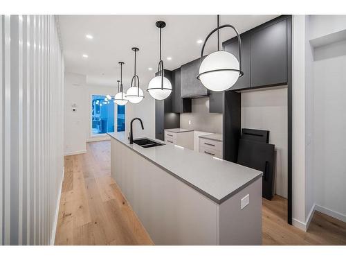 1406 22 Avenue Nw, Calgary, AB - Indoor Photo Showing Kitchen With Double Sink With Upgraded Kitchen