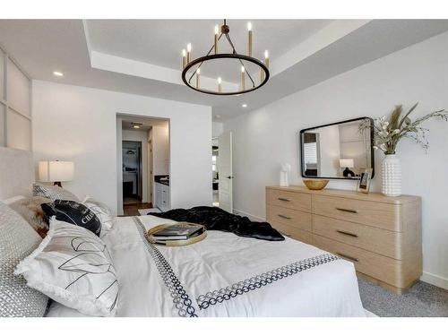 25 Snowberry Lane East, Okotoks, AB - Indoor Photo Showing Bedroom